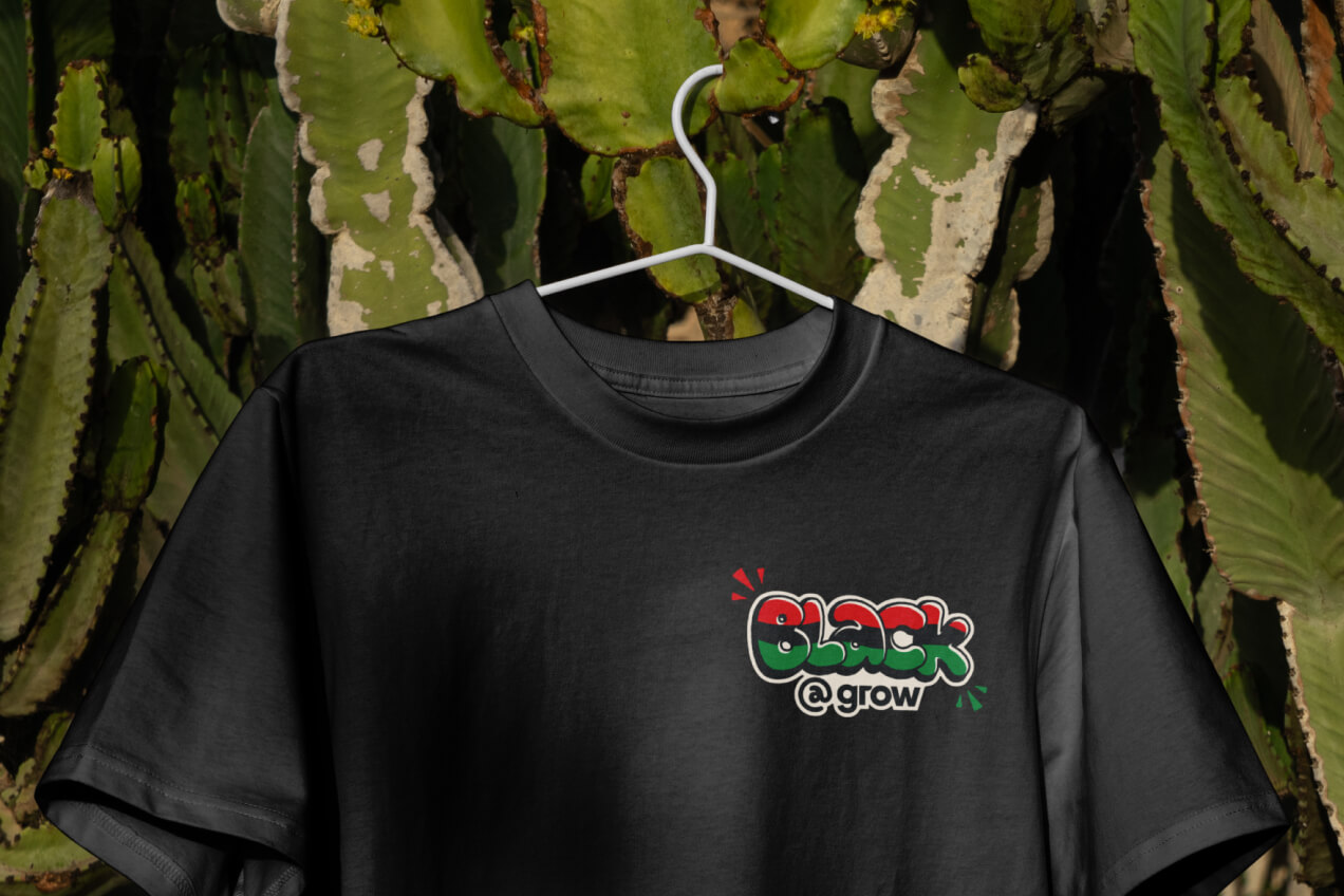 Winter-themed giftcard for Growshop. A small cabin sits in the snow. Snow-covered trees in the foreground. A starry night with a moon sits above.